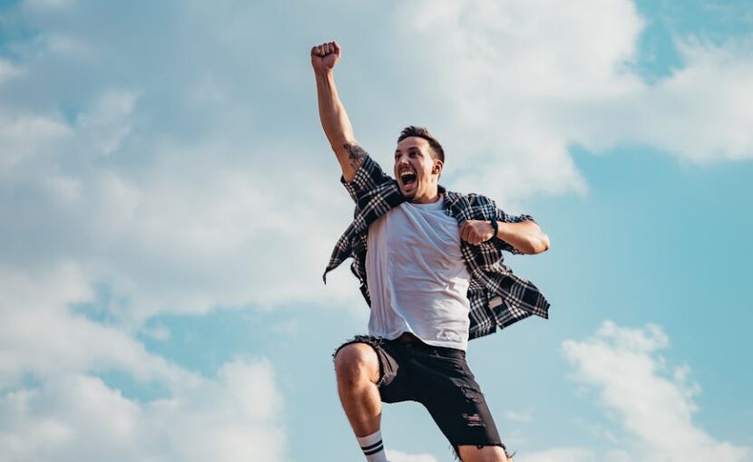 man jumping from a rock