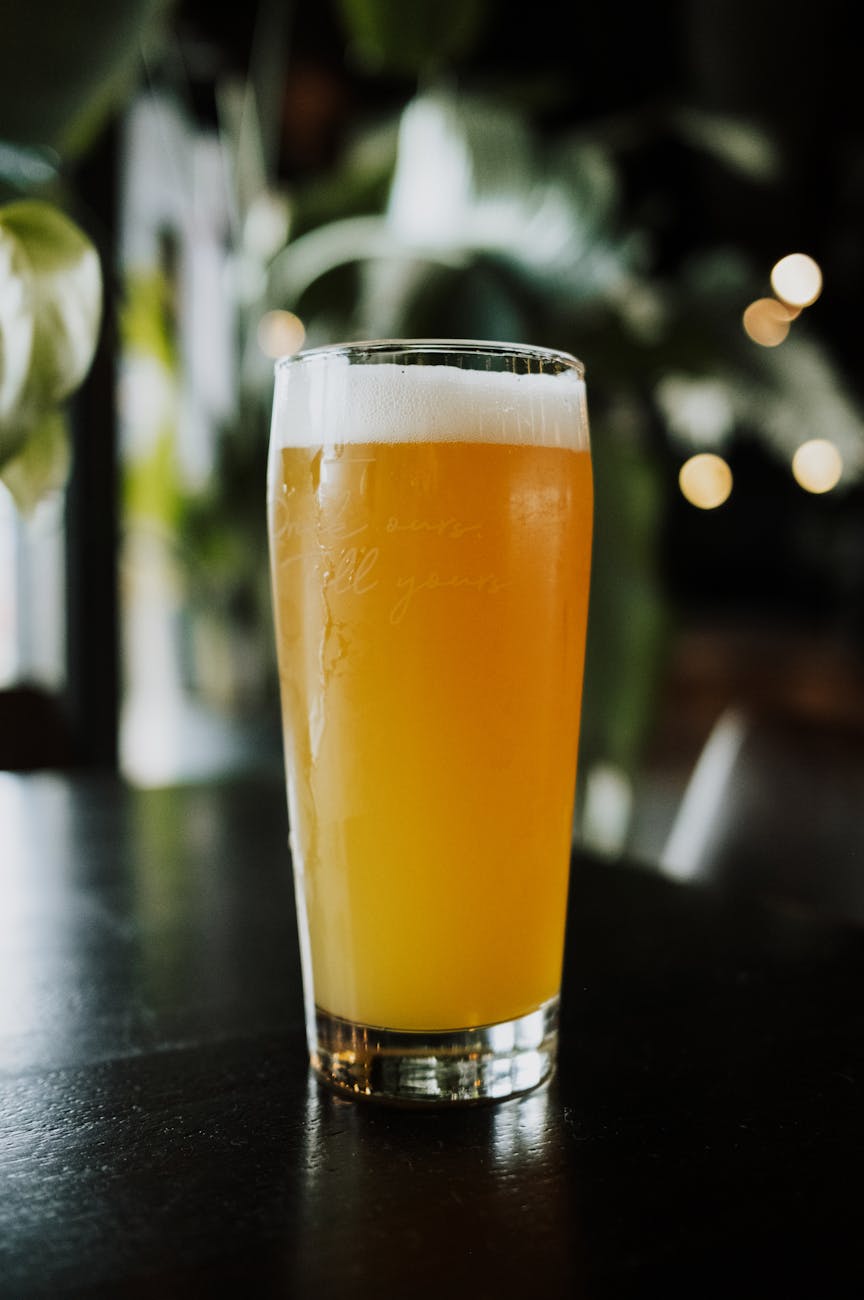 refreshing craft beer pint in rustic pub setting