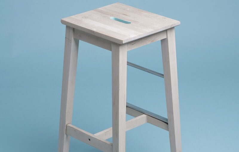 beige wooden bar stool