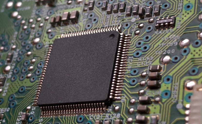 close-up photography of green motherboard